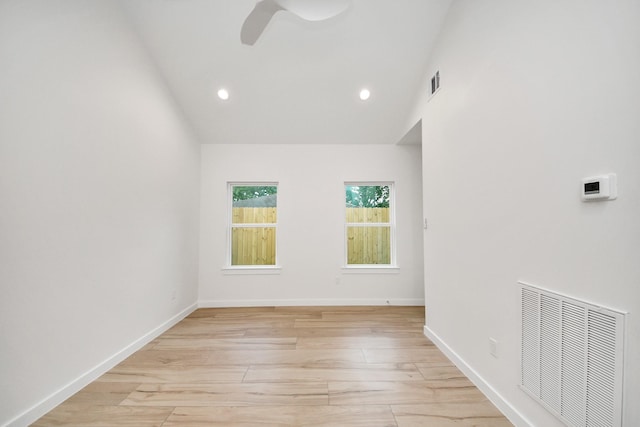 3907 Sumpter St, Houston, TX 77020 - unfurnished room featuring light wood-style floors, ceiling fan, recessed lighting, and high vaulted ceiling