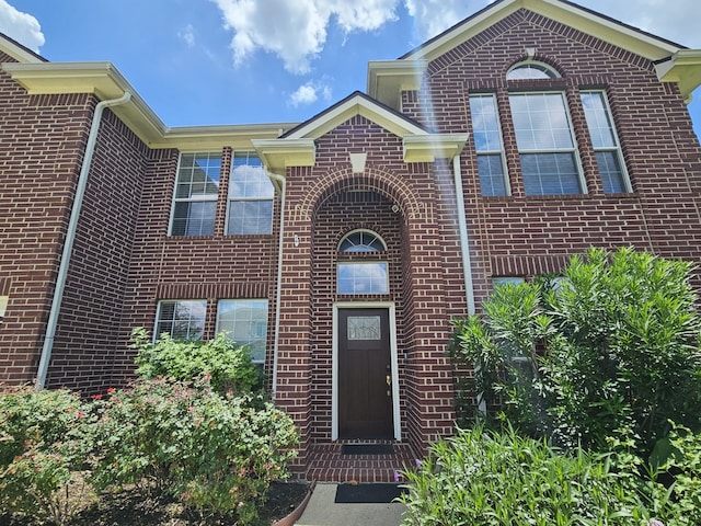 8123 Cove Timbers Ln, Tomball, TX 77375 - property entrance featuring brick siding