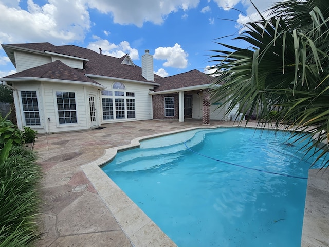 8123 Cove Timbers Ln, Tomball, TX 77375 - outdoor pool with a patio
