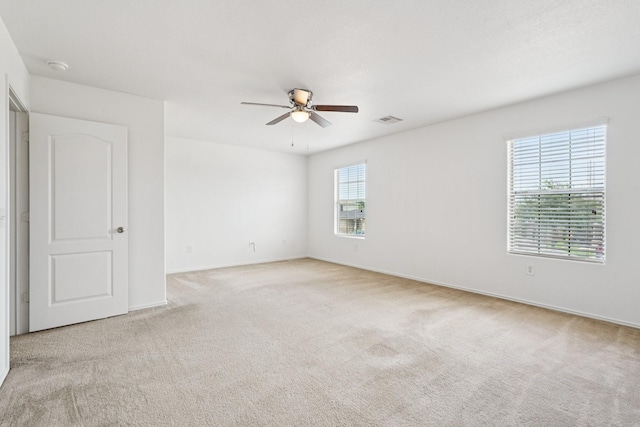 2607 Ensbrook Meadow Ln, Katy, TX 77449 - empty room with ceiling fan, carpet floors, and a smoke detector