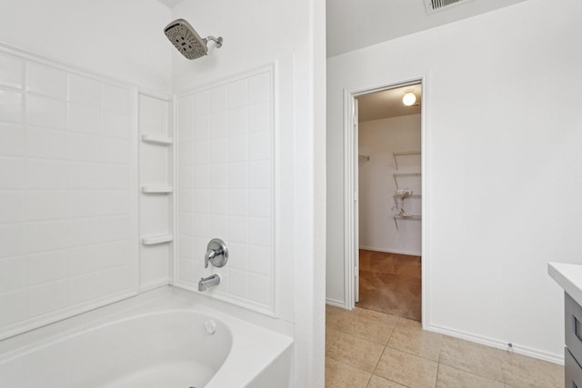 2607 Ensbrook Meadow Ln, Katy, TX 77449 - bathroom with tile patterned floors, vanity, shower / washtub combination, and a spacious closet