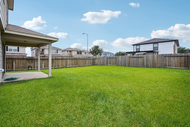 2607 Ensbrook Meadow Ln, Katy, TX 77449 - fenced backyard with a patio area
