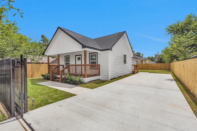 4412 Sayers St, Houston, TX 77026 - modern inspired farmhouse featuring covered porch and roof with shingles