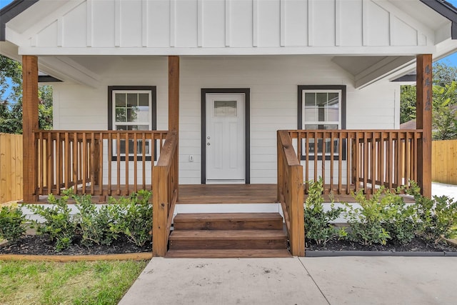 4412 Sayers St, Houston, TX 77026 - view of exterior entry with covered porch and board and batten siding
