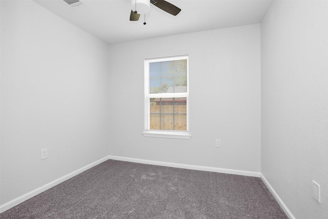 4412 Sayers St, Houston, TX 77026 - unfurnished room with dark carpet and ceiling fan