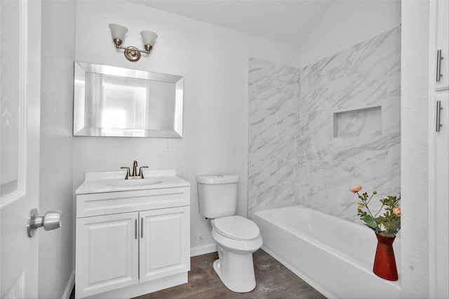 4412 Sayers St, Houston, TX 77026 - full bath with vanity, wood finished floors, bathing tub / shower combination, and lofted ceiling