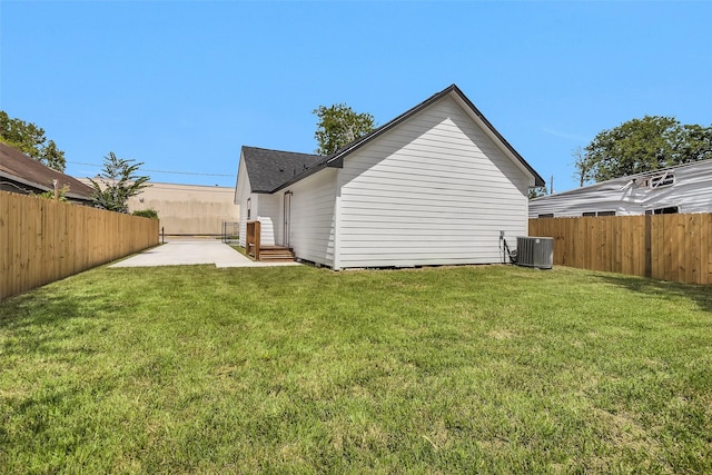 4412 Sayers St, Houston, TX 77026 - rear view of property featuring a patio area, a fenced backyard, and a shingled roof