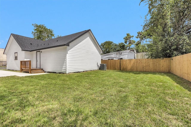 4412 Sayers St, Houston, TX 77026 - rear view of property featuring a fenced backyard and roof with shingles