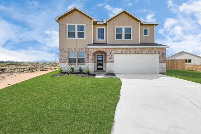 5318 Latigo Ct, Alvin, TX 77511 - view of front of property with driveway, an attached garage, and brick siding