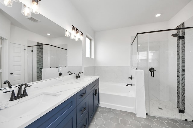 5318 Latigo Ct, Alvin, TX 77511 - full bath featuring a garden tub, a stall shower, double vanity, tile patterned flooring, and recessed lighting