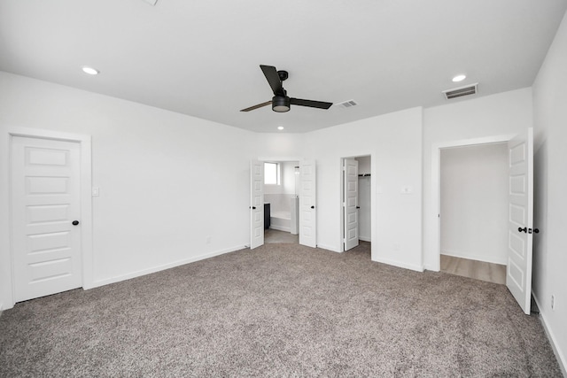5318 Latigo Ct, Alvin, TX 77511 - unfurnished bedroom featuring carpet, recessed lighting, a spacious closet, connected bathroom, and ceiling fan