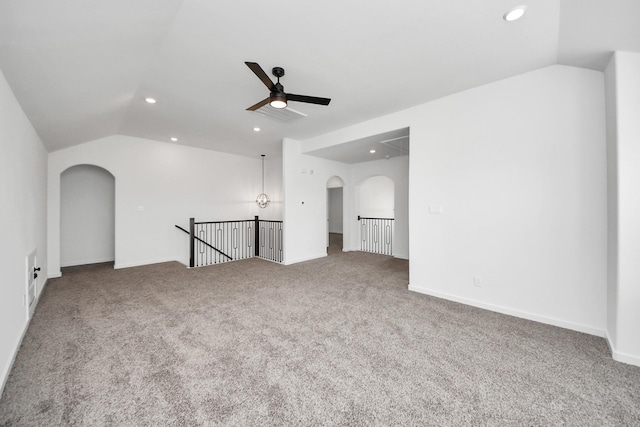 5318 Latigo Ct, Alvin, TX 77511 - unfurnished room featuring arched walkways, vaulted ceiling, recessed lighting, carpet flooring, and a ceiling fan
