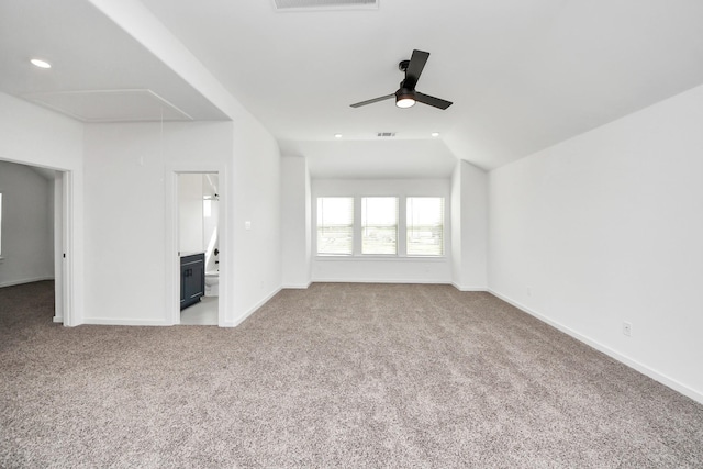 5318 Latigo Ct, Alvin, TX 77511 - unfurnished living room featuring attic access, carpet floors, lofted ceiling, and ceiling fan