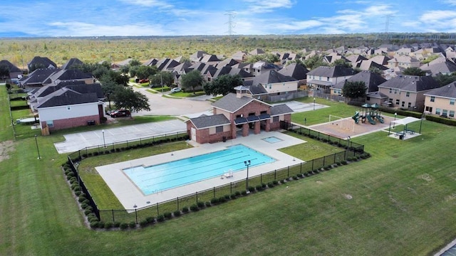 5318 Latigo Ct, Alvin, TX 77511 - aerial perspective of suburban area featuring a pool area