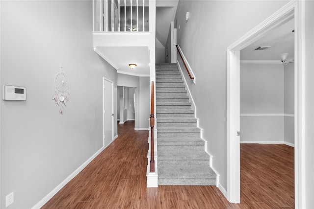 3327 Shady Glen Ln, Missouri City, TX 77459 - stairway featuring wood finished floors and ornamental molding