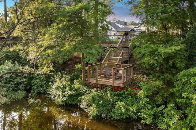 206 Lakemere St, Houston, TX 77079 - back of property with a deck with water view and stairs