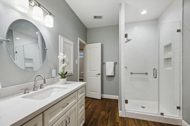 206 Lakemere St, Houston, TX 77079 - full bath with wood finished floors, a shower stall, and vanity