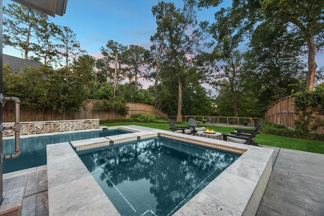 206 Lakemere St, Houston, TX 77079 - view of pool featuring an outdoor fire pit, a fenced backyard, a pool with connected hot tub, and a patio
