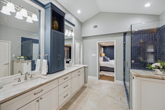 206 Lakemere St, Houston, TX 77079 - ensuite bathroom with double vanity, a shower stall, and vaulted ceiling