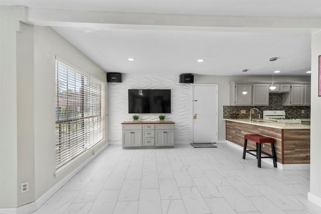 13530 Sharpbill Dr, Houston, TX 77083 - living room with light marble finish floors and recessed lighting
