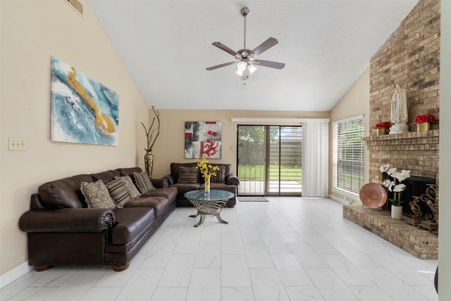 13530 Sharpbill Dr, Houston, TX 77083 - living room with a ceiling fan, a fireplace, light marble finish floors, and high vaulted ceiling