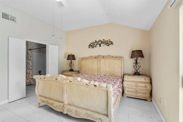 13530 Sharpbill Dr, Houston, TX 77083 - bedroom with light marble finish flooring, lofted ceiling, and connected bathroom