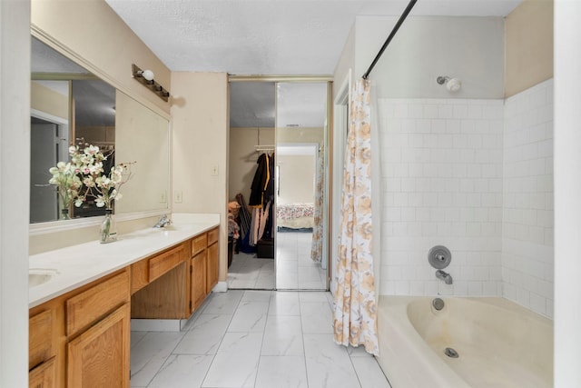 13530 Sharpbill Dr, Houston, TX 77083 - bathroom featuring shower / bath combo with shower curtain, double vanity, and marble finish flooring
