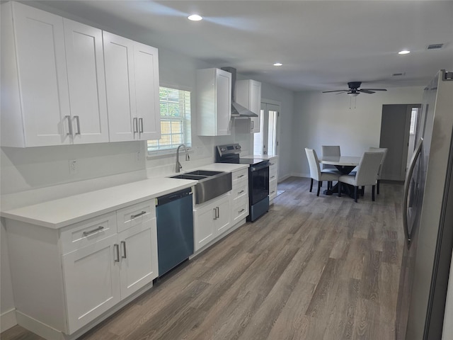 121 Tanglewood St, Baytown, TX 77520 - kitchen featuring electric stove, freestanding refrigerator, dishwasher, dark wood-type flooring, and white cabinets