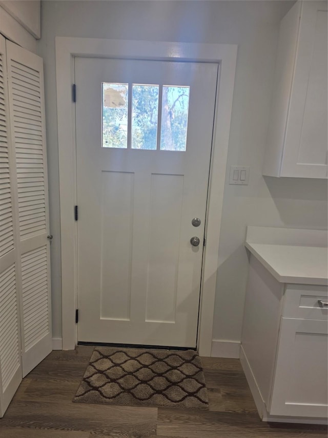121 Tanglewood St, Baytown, TX 77520 - doorway featuring dark wood finished floors
