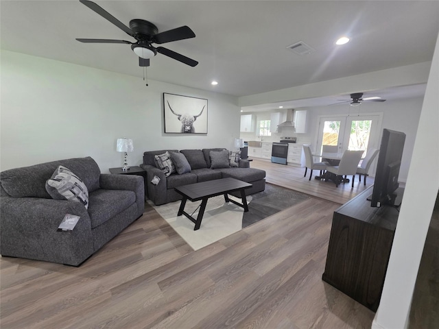 121 Tanglewood St, Baytown, TX 77520 - living area featuring ceiling fan, recessed lighting, and wood finished floors