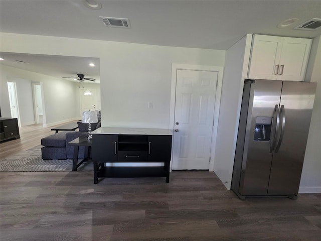 121 Tanglewood St, Baytown, TX 77520 - kitchen featuring stainless steel fridge, wood finished floors, white cabinets, a ceiling fan, and recessed lighting