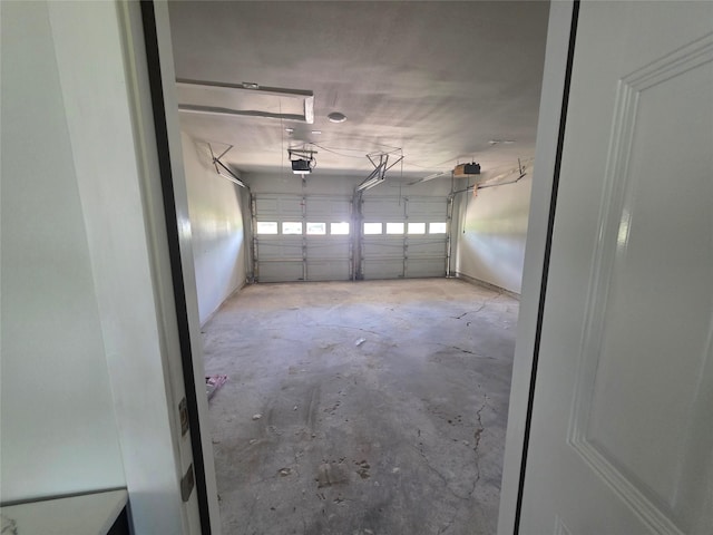121 Tanglewood St, Baytown, TX 77520 - garage featuring a garage door opener
