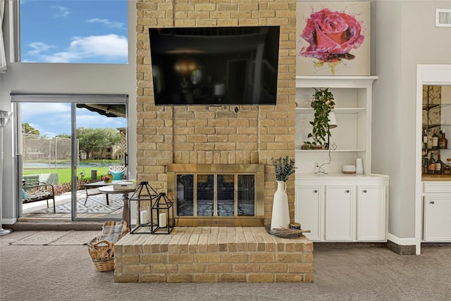 202 Old Bridge Lk, Houston, TX 77069 - living room with carpet floors and a fireplace