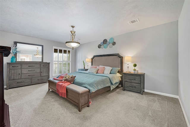 202 Old Bridge Lk, Houston, TX 77069 - bedroom featuring carpet floors and a textured ceiling