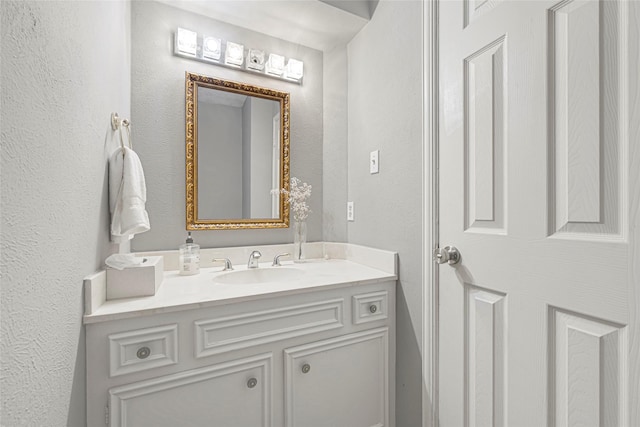 202 Old Bridge Lk, Houston, TX 77069 - bathroom featuring vanity and a textured wall