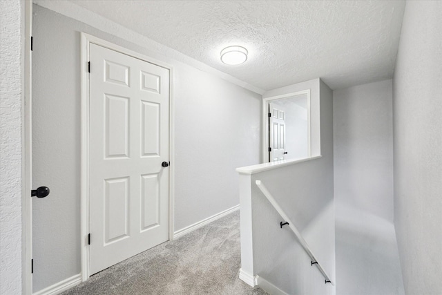 1804 Sleepy Creek Way, Pearland, TX 77581 - hall featuring an upstairs landing, carpet flooring, and a textured ceiling
