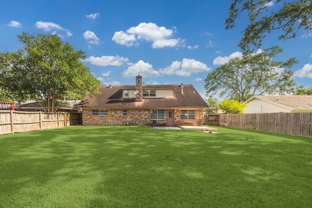 1804 Sleepy Creek Way, Pearland, TX 77581 - rear view of property with a fenced backyard, a chimney, and a patio area
