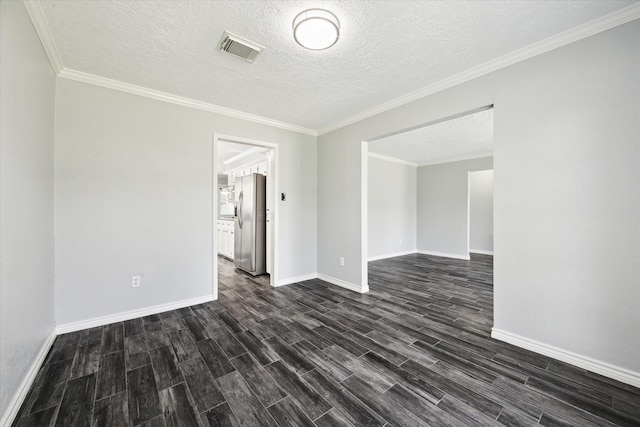 1804 Sleepy Creek Way, Pearland, TX 77581 - unfurnished room featuring dark wood-style floors, a textured ceiling, and ornamental molding