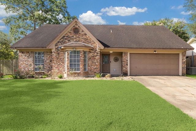 1804 Sleepy Creek Way, Pearland, TX 77581 - single story home featuring brick siding, concrete driveway, a garage, and a shingled roof