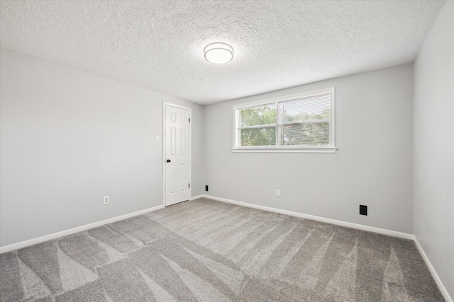 1804 Sleepy Creek Way, Pearland, TX 77581 - carpeted empty room with a textured ceiling and baseboards