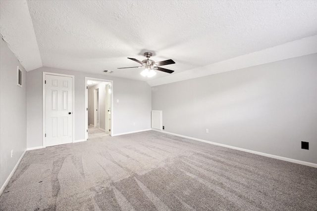 1804 Sleepy Creek Way, Pearland, TX 77581 - unfurnished bedroom featuring a textured ceiling, carpet flooring, a ceiling fan, and lofted ceiling
