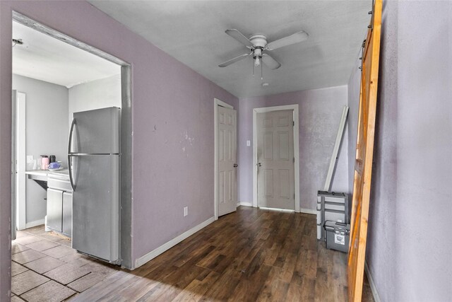 324 Erin, Houston, TX 77009 - kitchen with freestanding refrigerator, wood finished floors, and ceiling fan