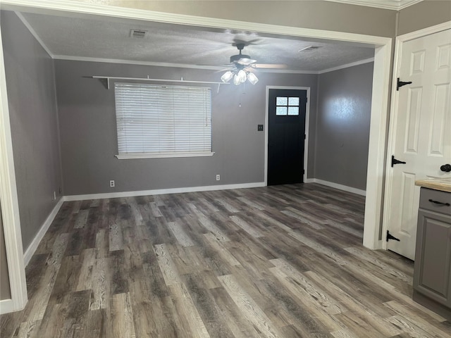 308 S 11th St, La Porte, TX 77571 - foyer featuring crown molding, wood finished floors, and ceiling fan