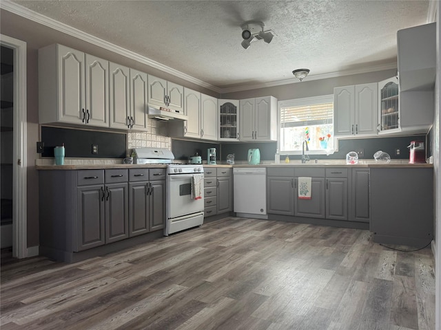 308 S 11th St, La Porte, TX 77571 - kitchen featuring gray cabinets, white appliances, under cabinet range hood, a textured ceiling, and dark wood-style floors