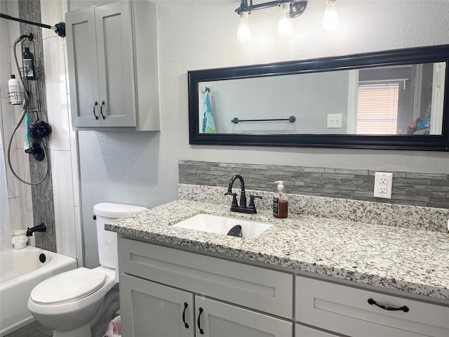 308 S 11th St, La Porte, TX 77571 - full bath with a textured wall, vanity, and shower / tub combination