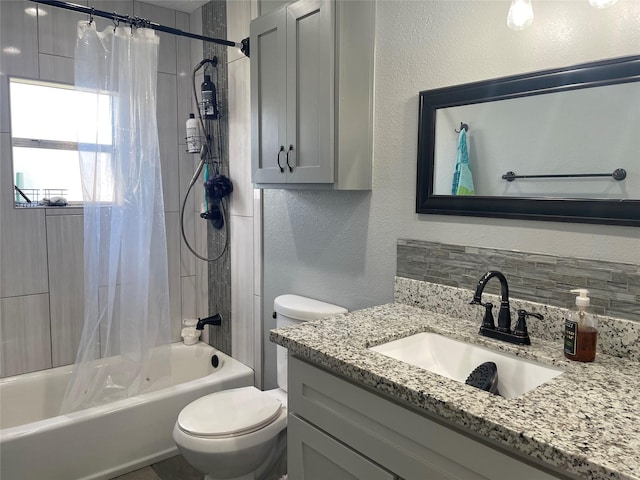 308 S 11th St, La Porte, TX 77571 - full bath featuring vanity, a textured wall, and shower / bathtub combination with curtain