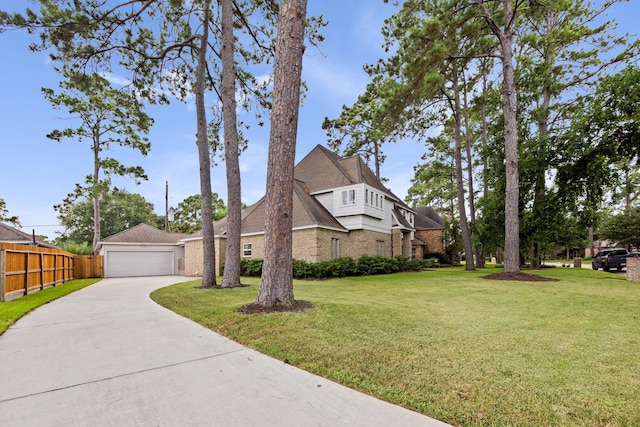 16235 Salmon Ln, Spring, TX 77379 - view of property exterior featuring brick siding and driveway