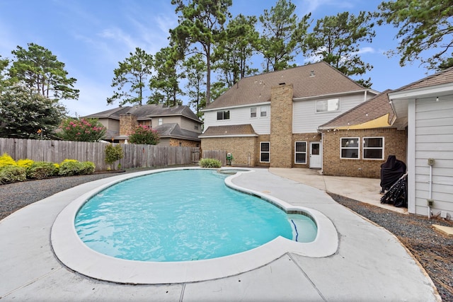 16235 Salmon Ln, Spring, TX 77379 - view of pool featuring a patio and a pool with connected hot tub