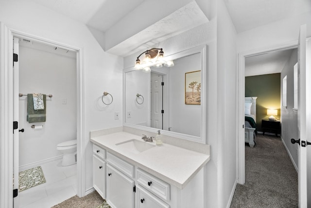 16235 Salmon Ln, Spring, TX 77379 - bathroom with vanity, connected bathroom, and tile patterned floors