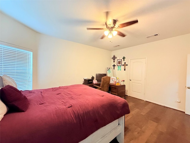 9458 Grand Spark Dr, Rosharon, TX 77583 - bedroom featuring ceiling fan and wood finished floors